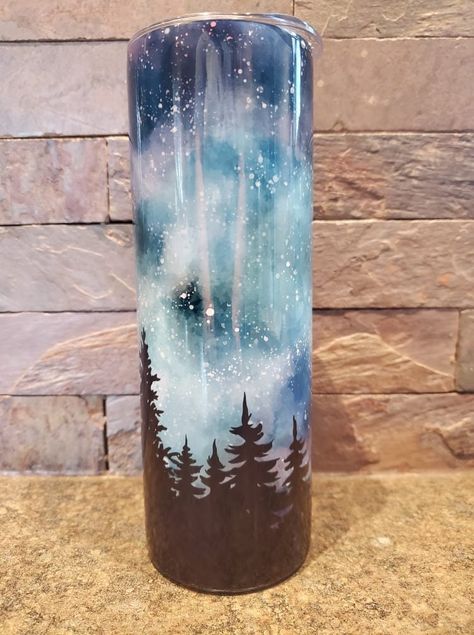 20 ounce galaxy tumbler! Includes: 20 ounce double wall insulated metal tumbler Leak proof lid Plastic straw Each Tumbler is handmade and may come out a little different! Please note this when purchasing Spring Tumblers, Galaxy Tumbler, Water Bottle Art, Peak A Boo, Tumbler Inspiration, Lake Design, Pen Ideas, Cricut Hacks, Metal Tumbler