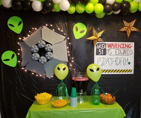 I did this backdrop for my husband birthday, he is into aliens. Alien Themed Decorations, Cowboys And Aliens Party Theme, Alien Themed Birthday Party, Alien Decorations Space Theme, Alien Party Decorations Outer Space, Alien Birthday Decorations, Alien Birthday Party, 51 Birthday, Alien Halloween