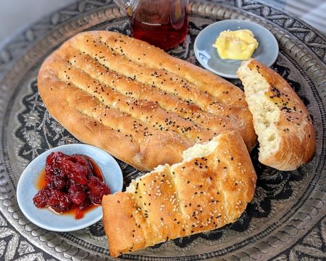 Crusty Persian flatbread with nigella and sesame seeds نون بربری Naan barbaree is one of the most popular flatbreads in Persian cuisine, most frequently consumed at the breakfast table to scoop up some creamy butter and homemade sour cherry jam or aromatic quince rose water jam! Though we would certainly have this bread in Tehran, … Continue reading Naan Barbaree → Persian Flatbread, Soup With Meatballs, Sour Cherry Jam, Persian Tea, Persian Recipes, Soup Appetizers, Cherry Jam, Persian Cuisine, Nigella Seeds