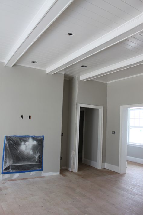 White Beadboard Ceiling With Beams, Tongue And Groove White Ceiling, White Faux Beams Ceiling, White Ceiling With Wood Beams Living Room, White Wooden Ceiling Living Room, Painted White Beams Ceiling, White Ceiling With White Beams, Paint Wood Beams On Ceiling, Painted Beams Ceiling Living Room