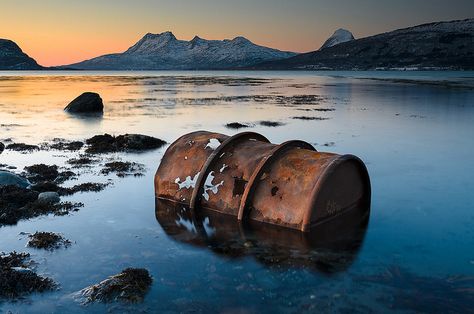 Rusty oil barrel in sunset Quite Aesthetic, Oil Spillage, Environment Photography, Chemical Waste, Oil Pollution, Tar Sands, Oil Barrel, Art Assignments, Linocut Printmaking