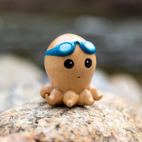 Finished Little Octo Boy! It's funny, since I've been stuck up in the mountains I've been feeling inspired to make sea critters. Seems like… Wooden Octopus, Canoe Building, One Word Art, Wood Magazine, Woodworking Books, Mobile Art, Feeling Inspired, It's Funny, Oak Stain