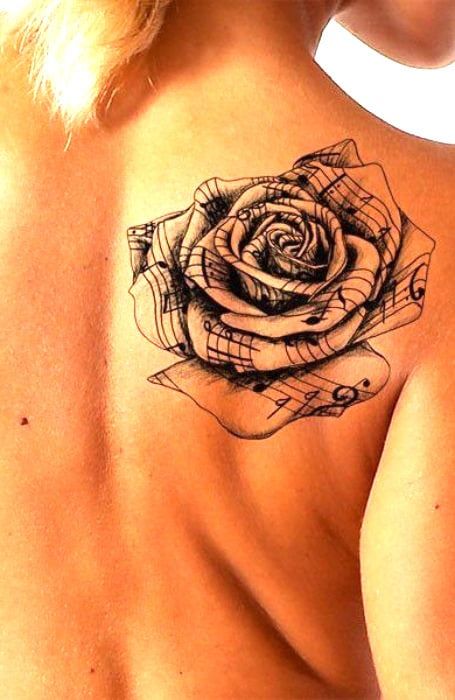 100 Coolest Music Tattoos for Men & Women - The Trend Spotter Music Rose Tattoo, Wolf Tattoo Traditional, Black Line Tattoo, Tiki Tattoo, Sanskrit Tattoo, Muster Tattoos, Hawaiian Tattoo, Tattoo Arm, Music Tattoo