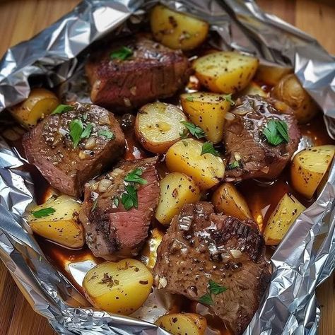 CHEF guy fieri 🥘 | Garlic Steak & Potato Foil Packets | Facebook Steak Foil Packets, Chicken In An Air Fryer, Potato Foil Packets, Eoe Recipes, Pouch Recipes, Foil Recipes, Foil Packet Potatoes, Foil Meals, Foil Pack Dinners