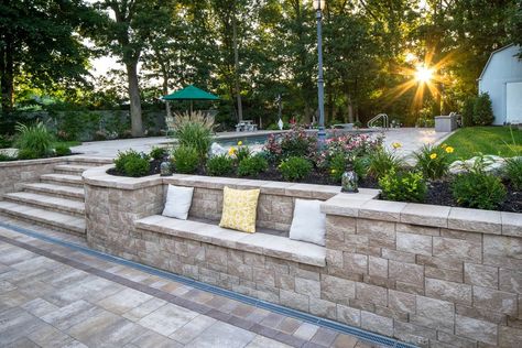 Sandstone Blend Dream Patio - New York - by Cambridge Pavingstones with ArmorTec | Houzz Backyard Retaining Walls, Cambridge Pavingstones, Sloped Backyard Landscaping, Dream Patio, Sloped Backyard, Landscaping Retaining Walls, Ideas Front Yard Landscaping, Landscaping Flowers, Front Yard Landscaping Plans