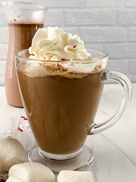 This homemade Polar Express Hot Chocolate Recipe is so fun and easy to make! Great flavors and easy to make for movie night! Disney World Hot Chocolate Recipe, Polar Express Hot Cocoa, Carette Paris Hot Chocolate Recipe, Fluffy Hot Chocolate, Hot Cocoa From Scratch, Polar Express Hot Chocolate Recipe, Polar Express Hot Chocolate, Birthday Foods, Best Hot Chocolate Recipes