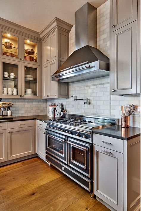 Gray cabinets to ceiling. Love this tile to ceiling also. From Beautiful Family Home with Traditional Interiors Grey Stained Kitchen Cabinets, Backsplash Herringbone, Stained Kitchen Cabinets, Dark Countertops, Traditional Interior Design, Grey Kitchens, Grey Kitchen, Kitchen Redo, Trendy Kitchen