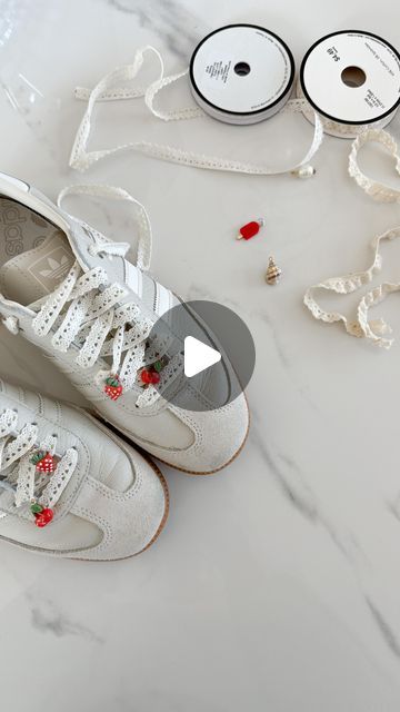 Aurelie Erikson on Instagram: "Sneaker lovers, this is your sign to switch out your laces for ribbons and charms! 🍒🎀🍓
While walking the streets of NYC last week, I spotted several girlies wearing the cutest kicks with ribbon laces and adorable charms; I couldn’t wait to try it myself! 👟🤩

Just add a small 🧷 to the end of the ribbon.

save & share with a sneaker lovin friend 🫶🏼

.
.
.
.
.
.
.
#sneakerheads #sneakeraddict #adidas #ribbon #diycrafts #fashioninspo #summerfashion #trending #diytutorial #shoeaddict #sneakerfiles #hobbylobbyfinds #viraltrend" Aurelie Erikson, Wearable Crafts, Ribbon Laces, Sneaker Lovers, Sneakers Addict, Diy Ribbon, Lace Ribbon, Viral Trend, Sneakers Outfit