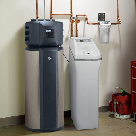 A water softener operates in a home. Water Softener Salt, Water Softener System, Water Softeners, Diy Plumbing, Water Heaters, Diy Water, Water Softener, Soft Water, Water Well