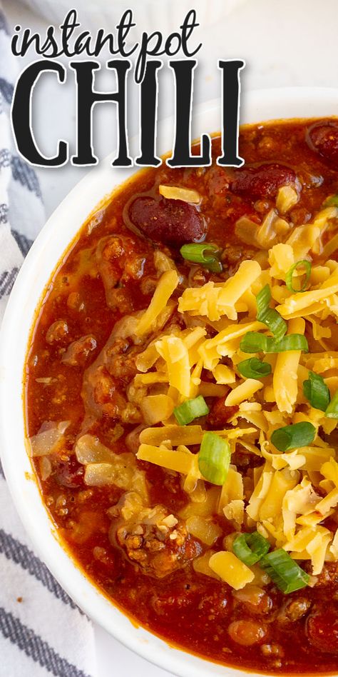 Bowl of chili in a white bowl with cheese on top. Simple Chili Recipe Instant Pot, Chili Recipe Instant Pot Easy, Insta Pot Chili Easy, Easy Chili Instant Pot Recipes, Chili In The Instant Pot, Instapot Chilli Recipe, Chili Beans Instant Pot, Instapot Chilli Recipe Easy, Steak Chili Recipe Instant Pot