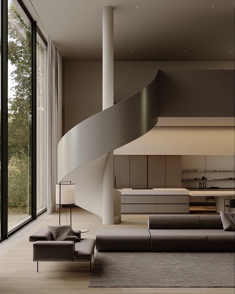 The floor-to-ceiling windows create a subtle connection between home and nature. With minimalist frames, the glass skin is almost invisible. The helical staircase goes beyond its function, also functioning as a sculpture that divides the living room from the kitchen integrated into the dining room. Designed by Shevchenko Oleksandra Design.