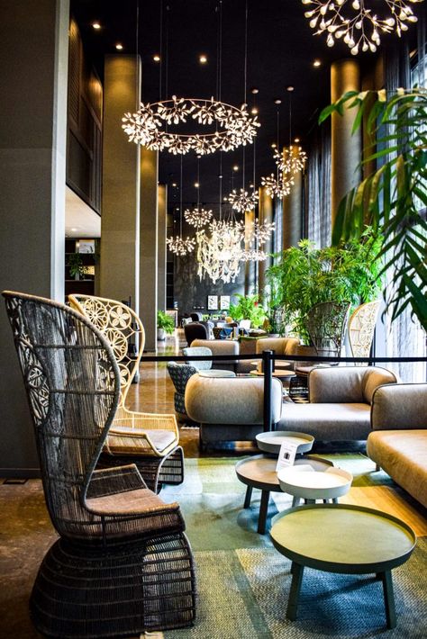 Chairs and decorative lamps in the lobby of Motel One Barcelona-Ciutadella. Cool Hotel Lobby, Vintage Hotel Lobby Aesthetic, Retro Hotel Lobby, Heritage Hotel Lobby, Boutique Motel, Boutique Hotel Lobby, Hotel Lobby Lounge, Modern Hotel Lobby, Decorative Lamps