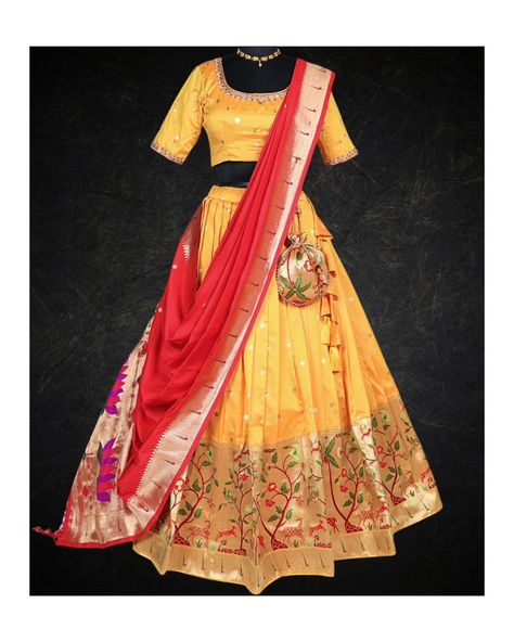 Introducing the stunning Yellow with Red Lehenga in Paithani Silk, a magnificent addition to the Lehenga collection. This paithani silk half saree lehenga features a rich paithani handloom silk lehenga in a warm, sunny yellow hue. The top of the outfit is crafted from pure raw silk fabric with intricate handwork on the front neck and sleeves. To add a touch of royal grace and contrast, it comes with a Banarasi Georgette dupatta in deep red. Perfect for weddings, celebrations, or any festive o... Banaras Dupatta, Yellow Paithani, Paithani Lehenga, Silk Half Saree, Latest Lehenga Designs, Ghaghra Choli, Half Saree Lehenga, Yellow Lehenga, Saree Lehenga