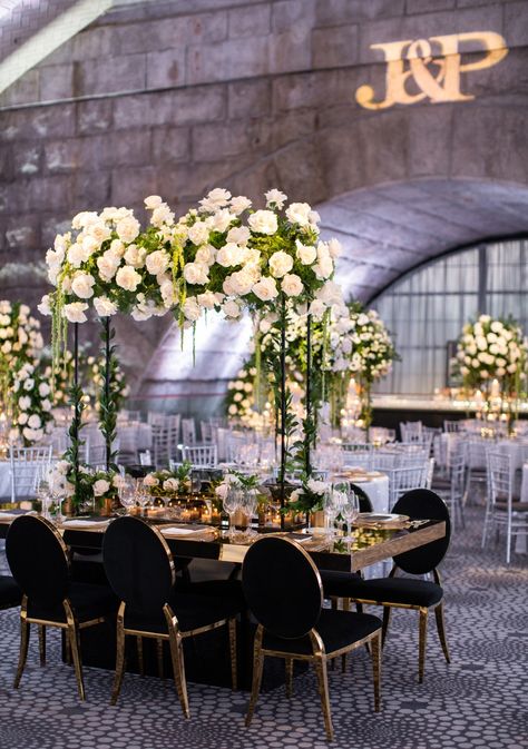 This Gold Black And White Wedding Is Stunning To The Max #wedding #weddingshoes #weddingday #marryingmybestfriend #weddingfashion #bridestyle #sayido #weddingflowers #weddingarrangements #weddinginspo #weddinginpiration #engagemnetrings #weddingphotography #engaged Wedding Table Themes, Black Wedding Decorations, White Weddings Reception, Black And White Wedding Theme, Tall Wedding Centerpieces, Black Gold Wedding, White Wedding Theme, Gold Wedding Theme, Wedding Decor Inspiration