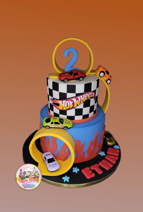 Hit wheels birthday cake 2 Tier Birthday Cake, Wheels Cake, Tier Birthday Cake, Toddler Birthday Cakes, Hot Wheels Cake, Tiered Cakes Birthday, Hot Wheels Birthday, Two Tier Cake, Tier Cake