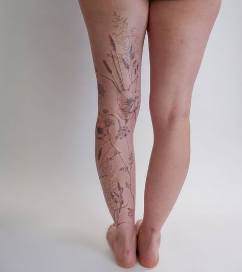 Women Back Of Calf Tattoo, Leg Tattoos Linework, Fine Line Leg Sleeve Tattoo, Wraparound Leg Tattoo, Botanical Tattoo Fine Line, Nature Leg Tattoos Women, Floral Leg Sleeve Tattoo Women, Simple Leg Sleeve Tattoo, Wildflower Leg Sleeve Tattoo