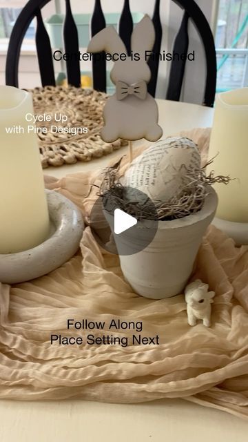 Pine Designs on Instagram: "Easter Tablescape Finished!

Our Easter Tablescape is now complete with the addition of a charming concrete bird nest. I adorned one of the plastic eggs with old book pages and affixed the cutest bunny on a stick using hot glue. Positioned alongside the burlap carrots and candle holders crafted from cement and balloons, our table showcases an elegant all-white and beige theme. 

With the table set, we’re now ready to focus on our place settings. Be sure to join us next week as we add the final touches!

Cycle Up with Pine Designs. 

#cycleupwithPineDesigns #homedecor#pinedesigns #lakesigns #citysigns #zipcode#lakedecor #handmade #scripturesigns #namesofgod #diyhomedecor #diydecor #easydecor #thriftstorefind #concretebowl #diyconcrete #makingconcreteintoclay  #Ea Beige Theme, Candle Holder Crafts, Concrete Bowl, Scripture Signs, Easter Tablescapes, Pine Design, Plastic Eggs, Our Place, Old Book Pages