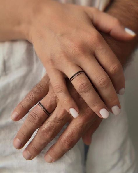 4. Sweet and simple line tattoos Marriage Ring Tattoos, Couple Ring Finger Tattoos, Tatoo Ring, Wedding Ring Finger Tattoos, Wedding Ring Tattoos, Love Wrist Tattoo, Simple Finger Tattoo, Anniversary Tattoo, Finger Tattoos For Couples