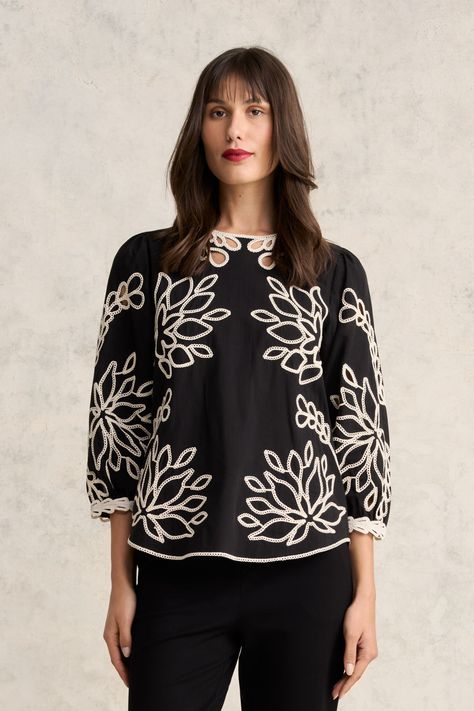 Offering a touch of understated glamour, our lightweight Embroidered Cotton Blouse is crafted from cotton voile and features beautiful floral-inspired placement embroidery in Ecru. With cut out panels and button back fastening, this shirt creates a sleek look with a black pant or paired with our Embroidered Cotton Skirt. Placement Print Dress, Cod Set, Cord Embroidery, Cotton Jackets Women, Placement Embroidery, Understated Glamour, Placement Print, Fancy Kurti, Textile Print