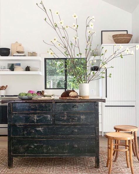 Vintage pieces add depth and personality to a space and make your home unique. We love the feel of this kitchen with a vintage island… Amber Lewis Interiors, Black Display Cabinet, Dining Room Hutch, Amber Lewis, Interior Minimalista, Black Dining Room, Vintage Dressers, Glass Cabinet Doors, Black Cabinets