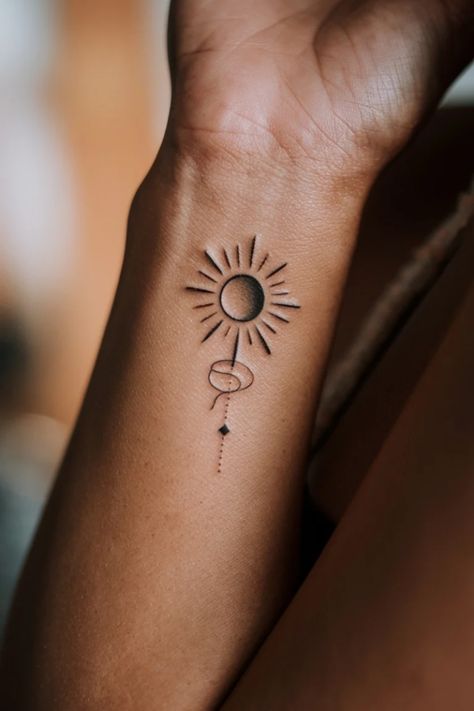 Minimalist sun tattoo on forearm with lines and dot details. Small Inside Forearm Tattoo Women, Womens Wrist Tattoos, Tattoo Wrist For Women, Protect Your Peace Tattoo, Zen Tattoos, Tattoos Peace, Women Forearm Tattoo, Small Wrist Tattoos For Women, Zen Tattoo