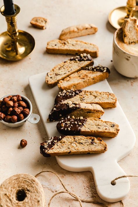 Chocolate dipped hazelnut biscotti recipe made gluten free and vegan. Super delicious and goes great with coffee! #biscottirecipe #glutenfree #vegan #chocolate #homemade #chocolatebiscotti #hazelnutbiscotti #holidayrecipes #christmascookies Hazelnut Biscotti Recipe, Hazelnut Biscotti, Vegan Caramel Apple, Gluten Free Biscotti, Vegan Gluten Free Snacks, Pumpkin Banana Bread, Gluten Free Flour Mix, Hazelnut Cookies, Vegan Pumpkin Pie