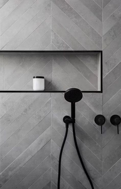 Herringbone vs Chevron Tile Patterns: How Are They Different? | Home Remodeling Contractors | Sebring Design Build Chevron Tile Pattern, Gray Shower Tile, Chevron Tile, Amazing Showers, Bathroom Shower Tile, Kitchen Wall Tiles, Trendy Bathroom, Black Shower, Grey Bathrooms