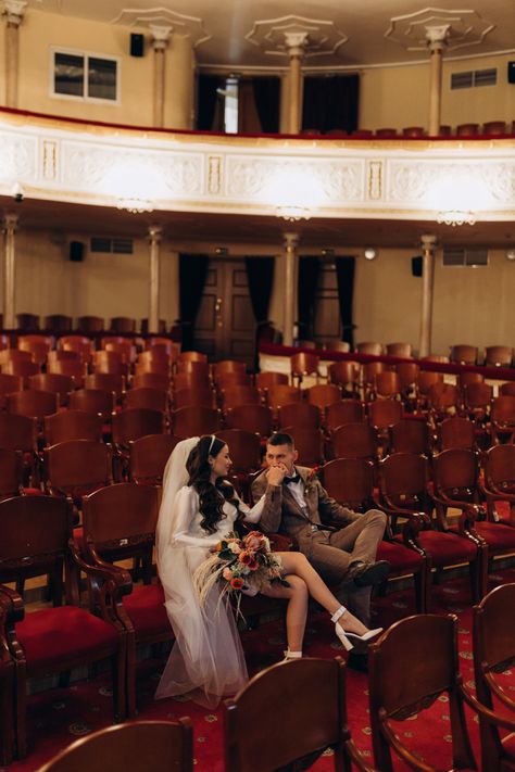 Theater Couple Photoshoot, Theater Wedding Ceremony, Movie Theater Engagement Photos, Md Poses, Theatre Photoshoot, Theater Photoshoot, Movie Theater Wedding, Broadway Wedding, Wes Anderson Wedding