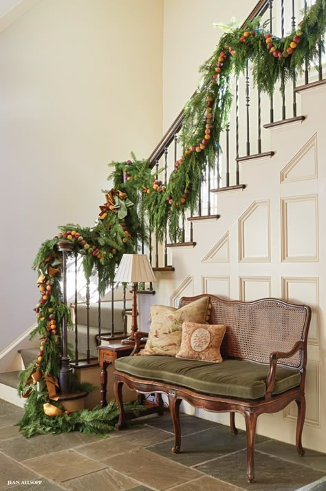 Staircase garland. #holiday #decorating Entryway Christmas Decorations, Potted Boxwood, Christmas Staircase Decor, Classy Christmas Decor, Christmas Stairs, Christmas Staircase, Staircase Decor, Classy Christmas, Stair Case