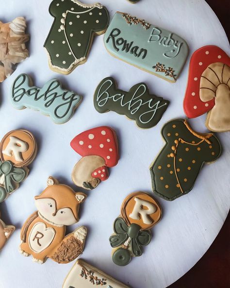 Cute baby shower cookies with a woodland theme. I love this theme. I especially love the mushrooms #sugarcookies #babyshower Forest Theme Cookies, Mushroom Theme Baby Shower Ideas, Mushroom Baby Shower Theme, Mushroom Baby Shower Cookies, Baby Shower Mushroom Theme, Mushroom Forest Baby Shower Theme, March Baby Shower Ideas, Woodland Cookies Baby Boy, Mushroom Baby Shower Ideas