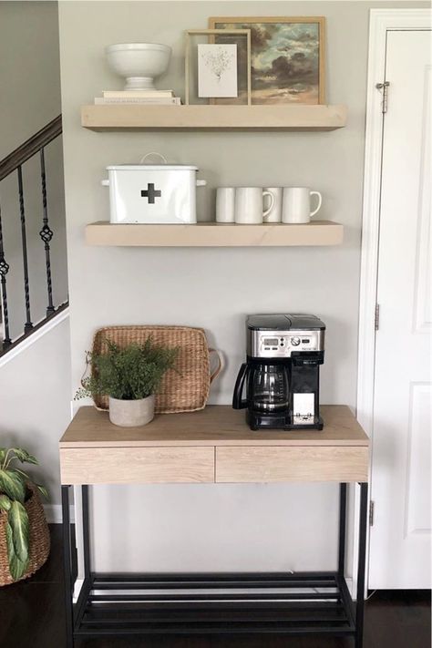 Whether you’re looking for a creative way to display your coffee maker or want to hang up all your Rae Dunn cups, these coffee bar ideas will give you some inspiration! With everything from DIY designs to farmhouse decor, you’ll find the perfect idea here! #coffeebar #coffeestation #coffeebarideas #raedunncoffee Coffee Bar On Desk, Cube Coffee Bar, Coffee Bar Console Table, Desk Coffee Bar, Minimalist Coffee Bar, Simple Coffee Bar, Vitrine Ikea, Kaffe Station, Chiro Office