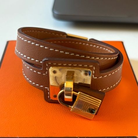 Hermes O kelly Gold leather wrap bracelet Fake Hermes Bracelet, Hermes Gold Bracelet, Hermes Clip Bracelet, Hermes Click Clack Bracelet, Hermes Kelly Bracelet Gold Metal, Hermes Jewelry, Leather Wrap Bracelet, Gold Leather, The Gold