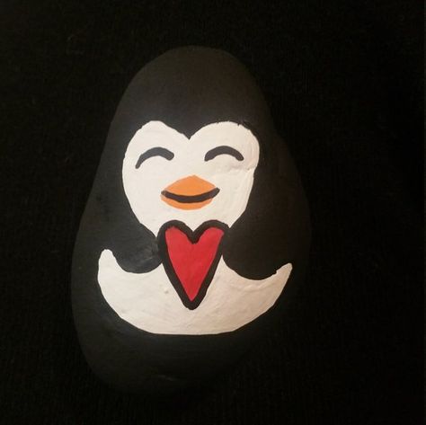 Penguin painted rock Penguin heart painted rock Love painted Penguin Heart, Willow Tree Angels, Carved Eggs, Holding Heart, Rustic Chic Decor, Wood Statues, Painted Rocks Craft, Rock Painting Patterns, Painting Rocks