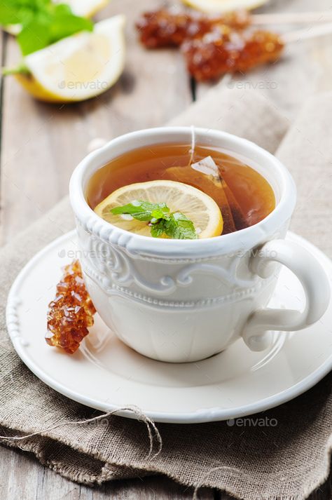 Hot tea with lemon and mint by OxanaDenezhkina. Hot tea with lemon and mint, selective focus #Sponsored #lemon, #tea, #Hot, #mint Tea With Lemon, Lemon And Mint, Cuppa Tea, Peppermint Tea, Lemon Tea, A Cup Of Tea, Hot Tea, Tea Recipes, Cup Of Tea