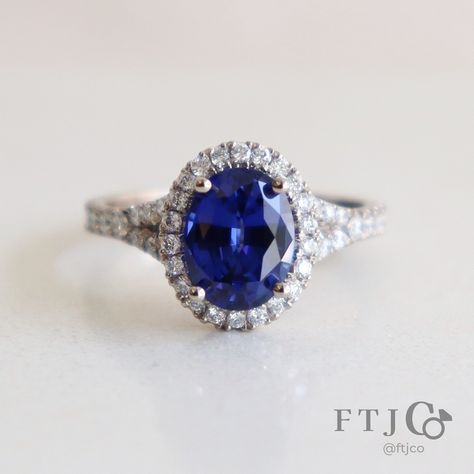 More is definitely more for this Princess Diana-inspired split shank sapphire halo ring. Not only does it feature a *large* blue oval sapphire (almost 2.5 ct), the halo and split shank are also encrusted with diamond pavé. It's a classic combo, taken to the max. 💎💙✨ . This is a Custom Oval Halo with a Diamond Pavé Split Shank made in our 18K AKARA People + Planet palladium white gold. It's set with a 2.48 ct Medium Blue Oval Mixed Cut Chatham lab grown sapphire, with twenty-two 1.2 mm SCS Cer... Sapphire Halo Ring, Split Shank, Halo Ring, Halo Rings, Princess Diana, Medium Blue, Pave Diamonds, Lab Grown, Halo