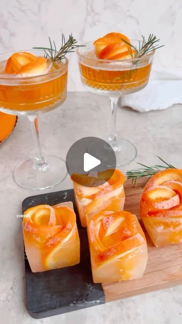 FeedFeed | Cocktails on Instagram: "@soberishmom’s Orange Rose Ice Cubes are a fancy addition to holiday drinks that are sure to impress guests! HOW-TO: 1. Fill ice molds half way full of water. 2. Thinly slice oranges (enough to bend), and cut the bottom 1/3 off each slice. 3. Bend the oranges into semi-circles, inserting them into the silicone ice mold. 4. Freeze completely, then serve with your favorite cocktails. Keep tagging #feedfeed for a chance to be featured. christmas time, cocktails, christmas drinks, holiday season, holiday cocktail, fancy ice, oranges, mocktails" Orange Slice Ice Cube, Fancy Ice Cubes Drinks, Cherry Ice Cubes, Birthday Serving Food Ideas, Frozen Ice Cubes Cocktails, Rose Ice Mold, Round Ice Cube Mold, Grapefruit Ice Cubes, Orange Juice Ice Cubes