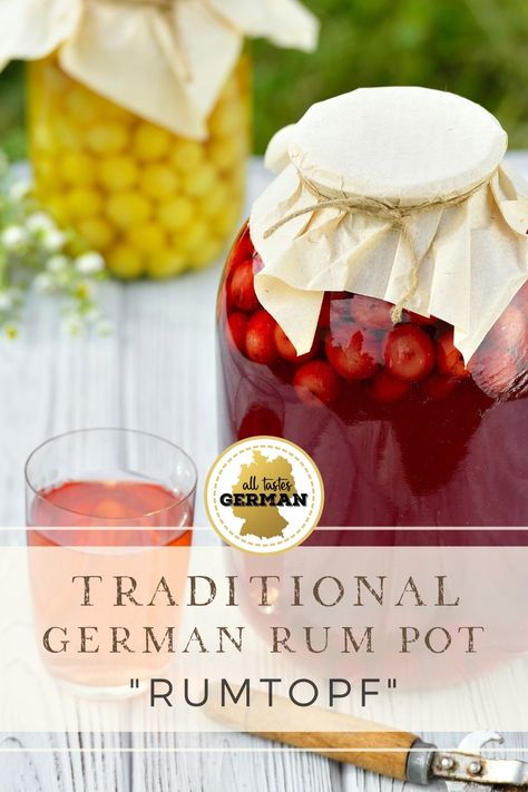 Large jar with Rumtopf, the German rum pot dessert with rum soaked seasonal fruit Rumtopf Recipe, Food Authentic, German Dishes, German Food Authentic, German Foods, German Desserts, Pudding Dessert, Liqueurs Recipes, Seasonal Fruit