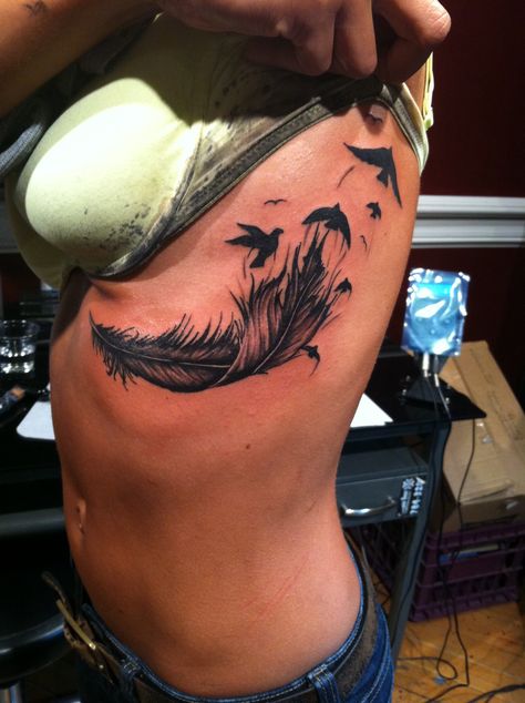 Cover Up Tattoos Underboob, Leaf Tattoo Under Breast, Feather Tattoos Underboob, Underboob Cover Up Tattoo, Rib Tattoos For Women Cover Up, Feather Back Tattoo, Feather Underboob Tattoo, Underboob Tattoo Coverup, Name Cover Up Tattoos