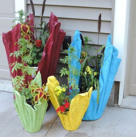 DIY Concrete Planter made from soaked cloth in wet concrete then dried over top of a bucket.  Once dried, spray paint or leave natural, fill with dirt and add your favorite flowers.  I'm so doing this!! Make Concrete Planters, Concrete Planters, A House, Front Porch, Cement, Flower Pots, Towels, Porch, Plants