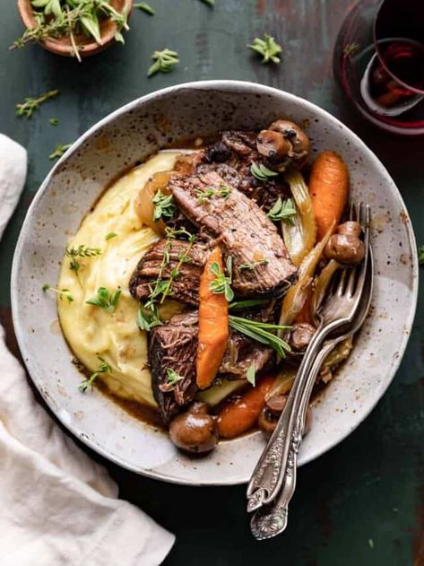 Southern Pot Roast w/ Cheesy Mashed Potatoes - Bites with Bri Southern Pot Roast, White Cheddar Mashed Potatoes, Dutch Oven Pot Roast, Oven Pot Roast, Cheddar Mashed Potatoes, Recipes With Enchilada Sauce, Potatoes Carrots, One Pot Dinner, Cooked Carrots