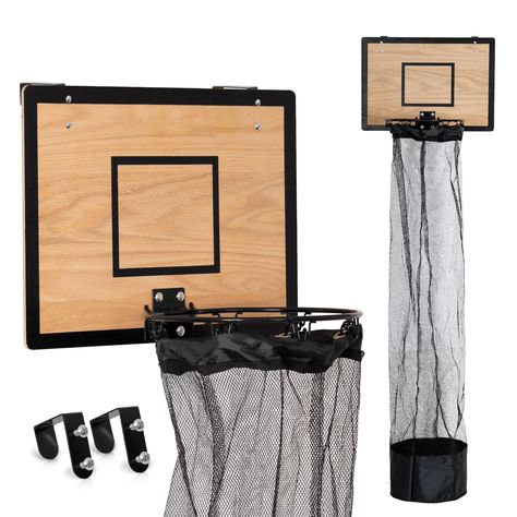 PRICES MAY VARY. HE SHOOTS, HE SCORES: Enjoy cleaner, clutter-free rooms by making collecting laundry fun! SWISHHH: Our large capacity basketball hoop hamper is 4-foot-deep for maximum storage. The black mesh hamper bag is removable and has a zipper on the bottom to easily empty the dirty clothes into a laundry basket. BUZZER BEATER: Unlike other basketball hampers on the market ours offers a stylish modern design made with wood. This basketball room decor piece will truly elevate the look of yo Basketball Room Decor, Buzzer Beater, Basketball Room, Basketball Hoop, Laundry Basket, The Door, Basketball, Room Decor, Design