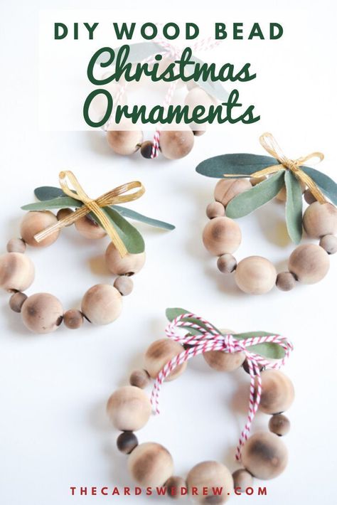 Learn how to make these easy DIY Wood Bead Ornaments and skip over the Etsy sellers! These DIY Christmas Ornaments are cute and fun and can be great for a farmhouse theme or as decorations on Christmas packages. All you need are wood beads, floral wire, and some decorations! #woodbead #ornaments #DIY #Christmas #farmhouse Wood Bead Ornaments, Beaded Ornaments Diy, Christmas Diy Kids, Wood Beads Diy, Bead Ornaments, Diy Christmas Ornaments Easy, Diy Christmas Ornament, Beaded Christmas Ornaments, Handmade Christmas Decorations