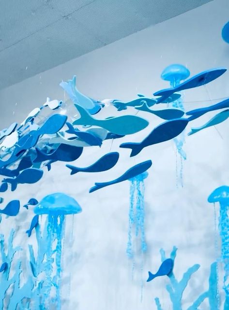 Under The Sea Diy Crafts, Scuba Party Theme, Diy Sea Creatures Decorations, Ocean Theme Birthday Decorations, Ocean Theme Party Decorations Diy, Ocean Window Display, Diy Ocean Theme Decor, Ocean Party Decor, Scuba Theme Vbs