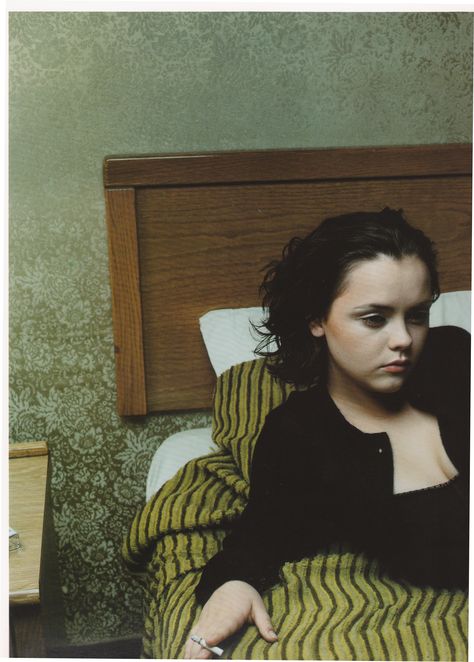 Christina Ricci from Annie Leibovitz' Women Annie Leibovitz, Christina Ricci, Sloth, A Woman, Bed, Yellow, Photography, Black