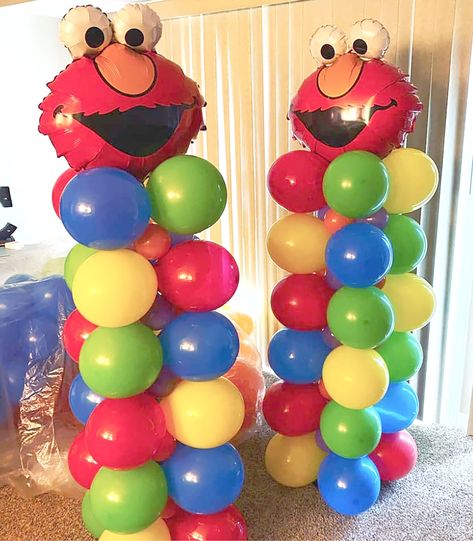 Sesame Street Balloon Columns, Elmo Balloon Column, Elmo Birthday Food Ideas, Elmo Balloon Bouquet, Elmo Trunk Or Treat Ideas, Elmo Balloon Garland, Sesame Street Cake Table, Elmo First Birthday Party Boy, Sesame Street Balloon Arch