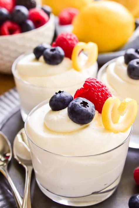 This easy Lemon Mousse is the perfect way to welcome spring! Light, fluffy mouse infused with the sweet flavor of lemon...this sweet treat is delicious all on its own or topped with fresh berries. Whether you're looking for a last minute Easter dessert or the perfect dessert for spring showers, this 5-ingredient Lemon Mousse is sure to be a hit! Desserts With Fruit, Mothers Day Desserts, Dessert Parfait, Lemon Mousse, Cheesecake Mousse, Spring Showers, Spring Light, Rich Desserts, Spring Desserts