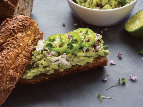 Sunflower Guacamole made with fresh sprigs of microgreens! Sure, it breaks from tradition, but sunflower greens infuse guacamole with fresh, nutty flavour. Beyond using as a dip for tortilla chips or sliced vegetables, try using this guac as a spread for toasted bread and top with roasted chicken, fried eggs, black beans, or smoked salmon. Sunflower Microgreens, Microgreen Recipes, Sunflower Shoot, Sliced Vegetables, Microgreens Recipe, Homesteading Recipes, Dip For Tortilla Chips, Avocado Juice, Guacamole Ingredients