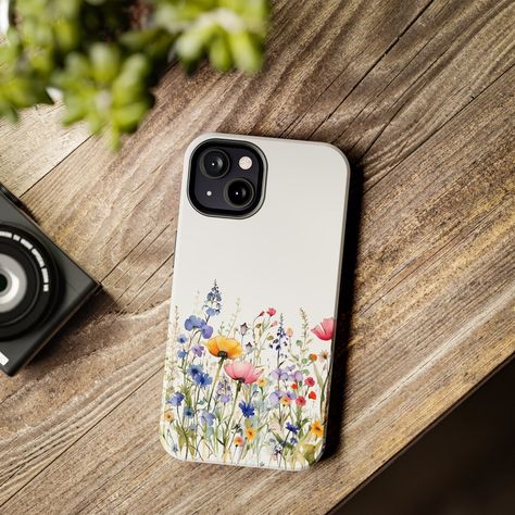 🌸 **Elegant Wild Bloom Watercolor Phone Case** 🌸 **Immerse Yourself in Nature's Delicate Beauty Every Day** Are you a nature enthusiast with an eye for elegance and a heart for the environment? Then our Elegant Wild Bloom Watercolor Phone Case is the perfect companion for your daily adventures! Each case is a canvas showcasing a stunning, hand-painted watercolor floral design, transforming your phone into a piece of art that celebrates the wild beauty of nature. It's more than just a phone cas Wild Flowers Phone Cases, Watercolor Phone Case, Phone Case Diy Paint, Gifts 2022, Nature Enthusiast, Wild Beauty, Floral Phone Case, Delicate Beauty, Flower Phone Case