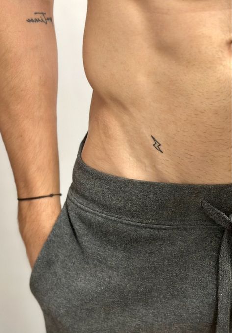 Meaningful Tattoos For Men, Rib Tattoos For Guys, Lightning Tattoo, Private Tattoos, Tatuagem Masculina Pequena, Small Chest Tattoos, Bauch Tattoos, Simple Tattoos For Guys, Men's Small Tattoo