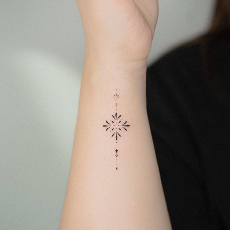 Fine line ornament tattooed on the wrist Fine Line Ornamental Tattoo, Ornamental Tattoos, Small Mandala Tattoo, Red Moles, Bohemian Tattoo, Tiny Wrist Tattoos, Cross Tattoos For Women, Star Tattoo Designs, Tattoo Signs